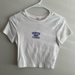 Garage Stormi Tee | White Denver Colorado |
Baby tee